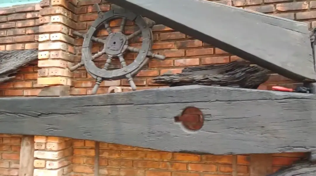 Tang shipwreck remains embedded in the wall